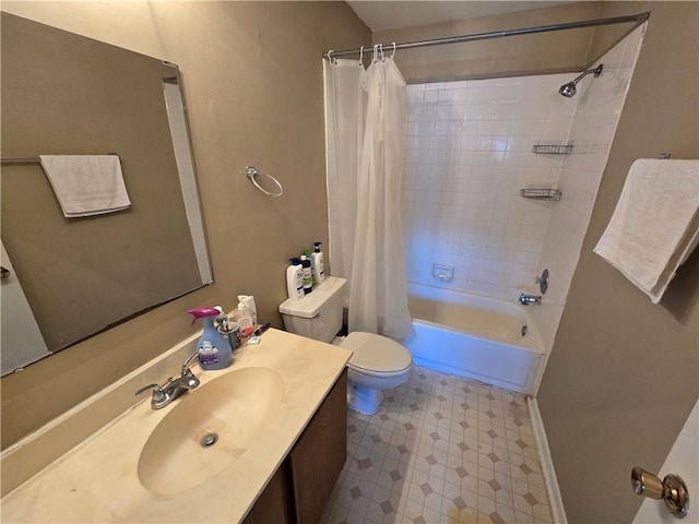 full bathroom with shower / tub combo, vanity, and toilet