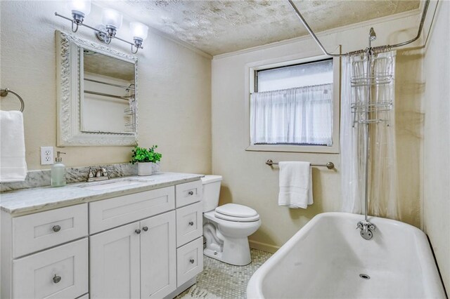 full bathroom featuring shower / bath combo, tile patterned floors, a textured ceiling, toilet, and vanity