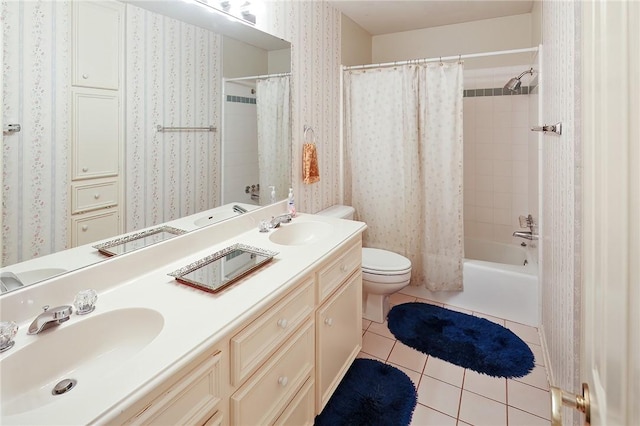 full bathroom with toilet, shower / tub combo, vanity, and tile patterned floors