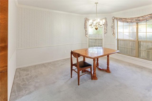 dining space featuring carpet, an inviting chandelier, and crown molding