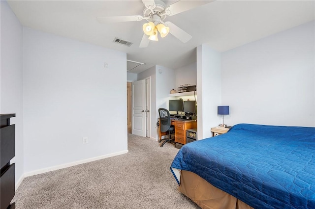 1725 Harvey Mitchell Pkwy S Unit 2433, College Station, TX 77840 - bedroom featuring carpet, baseboards, a ceiling fan, and attic access