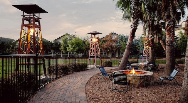 1725 Harvey Mitchell Pkwy S Unit 2433, College Station, TX 77840 - playground at dusk with an outdoor fire pit