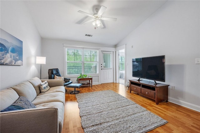 1725 Harvey Mitchell Pkwy S Unit 2433, College Station, TX 77840 - living area featuring vaulted ceiling, light wood-style floors, ceiling fan, and baseboards