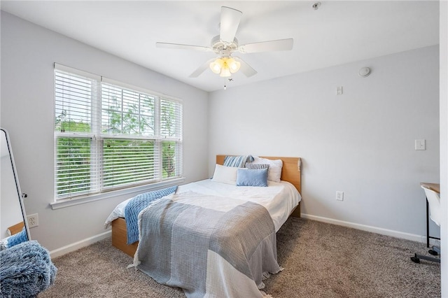 1725 Harvey Mitchell Pkwy S Unit 2433, College Station, TX 77840 - carpeted bedroom with baseboards and ceiling fan