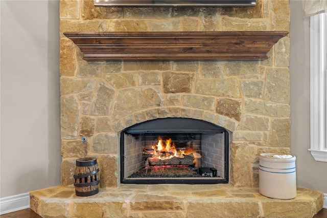 details featuring a stone fireplace