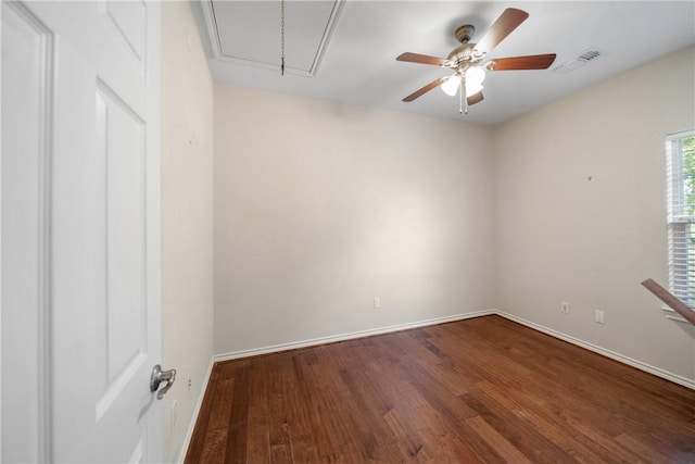 32287 Rochen Rd, Waller, TX 77484 - unfurnished room with attic access, a ceiling fan, wood finished floors, and baseboards