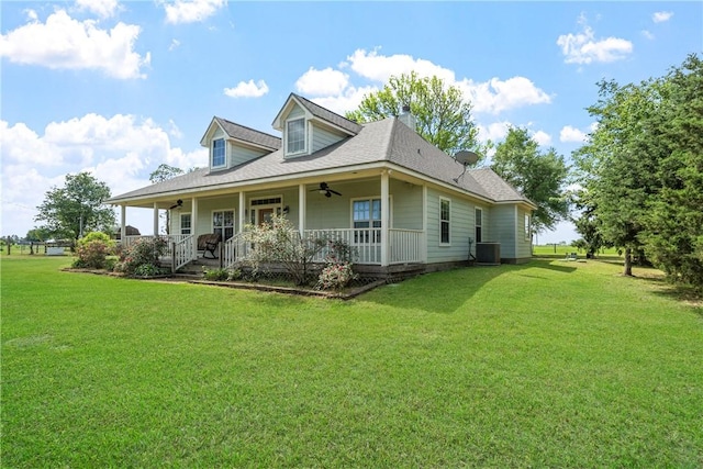 32287 Rochen Rd, Waller, TX 77484 - back of property with a ceiling fan, covered porch, central AC, and a lawn