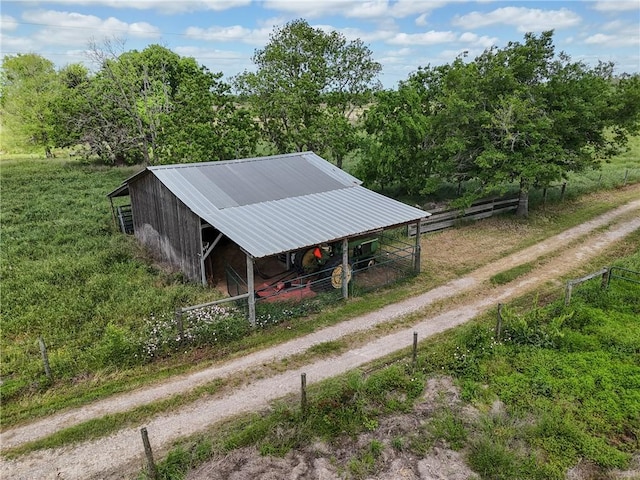 32287 Rochen Rd, Waller, TX 77484 - view of outbuilding with an outbuilding, an exterior structure, and driveway