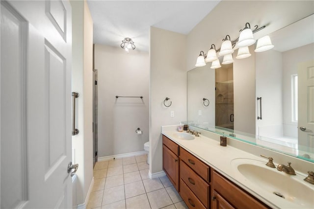 32287 Rochen Rd, Waller, TX 77484 - bathroom featuring a shower stall, tile patterned floors, a bath, double vanity, and baseboards