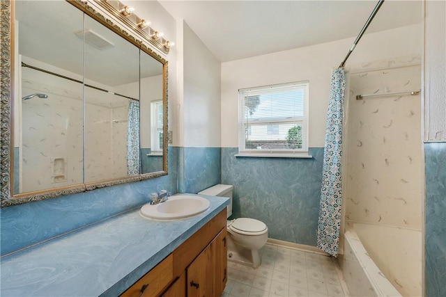 bathroom featuring toilet, tile patterned floors, a shower with shower curtain, and vanity
