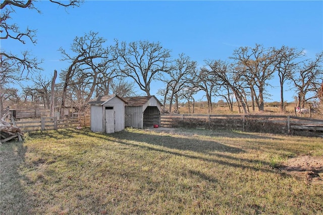 24248 State Highway 6 S, Navasota, TX 77868 - view of yard featuring a storage unit and a rural view