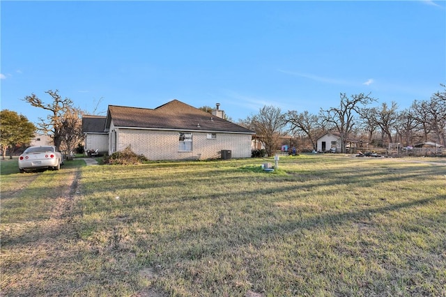 24248 State Highway 6 S, Navasota, TX 77868 - view of side of property with central AC and a yard