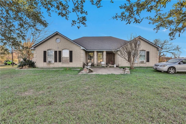 24248 State Highway 6 S, Navasota, TX 77868 - ranch-style home with a patio area and a front yard
