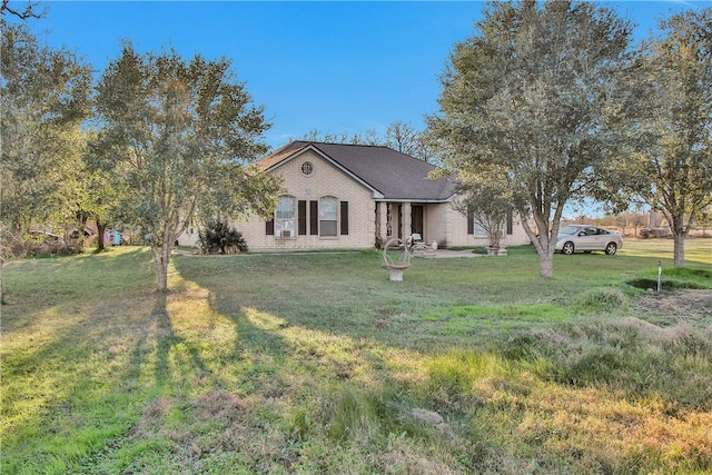 view of front of property with a front lawn