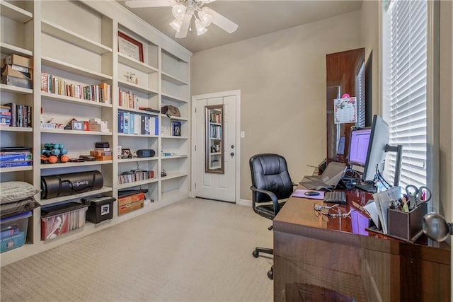 office featuring light colored carpet and ceiling fan