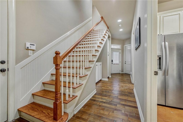 stairway with wood-type flooring