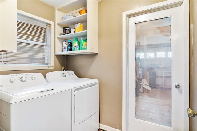 clothes washing area with laundry area and independent washer and dryer