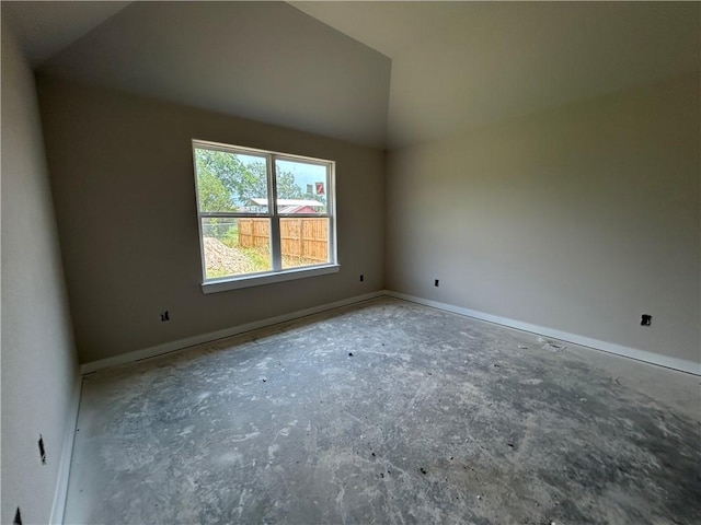 2814 Messenger Way, Bryan, TX 77802 - unfurnished room with vaulted ceiling and baseboards