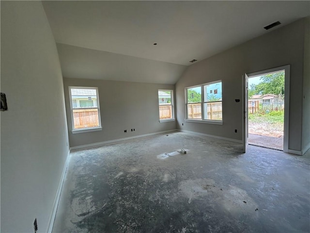 2814 Messenger Way, Bryan, TX 77802 - spare room with vaulted ceiling, baseboards, and unfinished concrete flooring