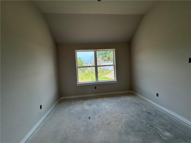 2814 Messenger Way, Bryan, TX 77802 - empty room with baseboards, vaulted ceiling, and unfinished concrete flooring