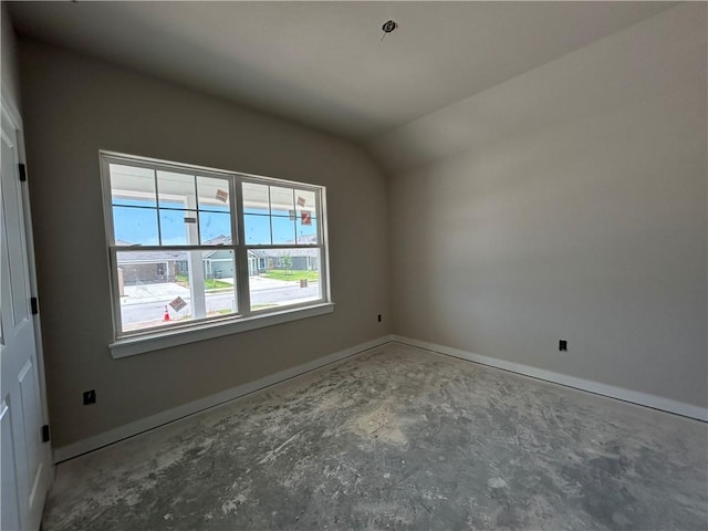 2814 Messenger Way, Bryan, TX 77802 - spare room with baseboards, lofted ceiling, and concrete flooring