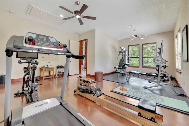 15184 Fm 2620, Bedias, TX 77831 - workout room featuring a ceiling fan and attic access