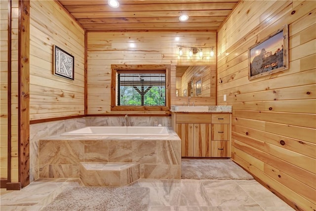 15184 Fm 2620, Bedias, TX 77831 - bathroom featuring wooden walls, vanity, a bath, wood ceiling, and recessed lighting