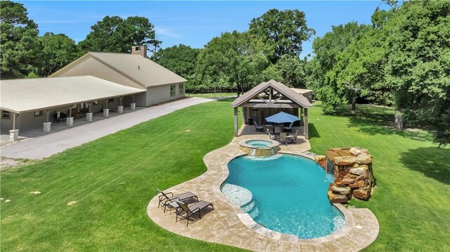 15184 Fm 2620, Bedias, TX 77831 - view of pool featuring a gazebo, a yard, a patio area, and a pool with connected hot tub
