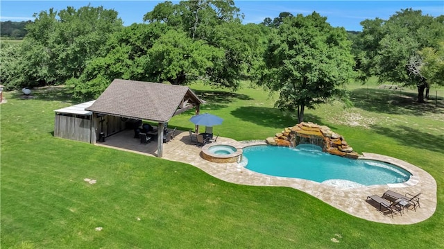 15184 Fm 2620, Bedias, TX 77831 - view of pool with a gazebo, a patio area, a yard, a pool with connected hot tub, and view of scattered trees