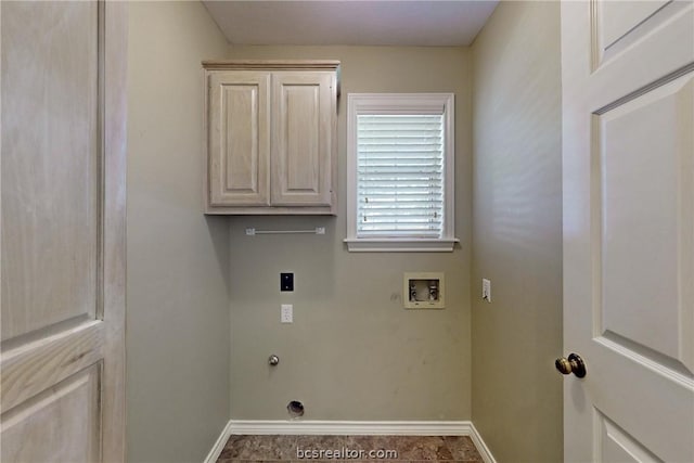 laundry room featuring cabinets, tile patterned flooring, washer hookup, and hookup for an electric dryer