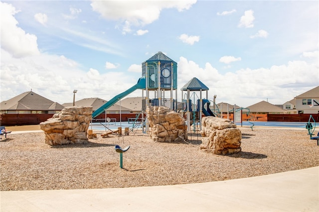 community play area featuring fence