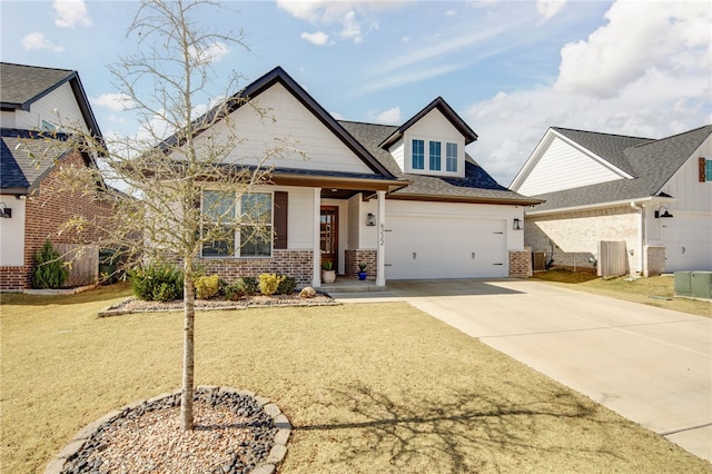 view of front of home featuring concrete driveway, brick siding, a front lawn, and a shingled roof