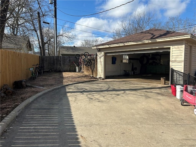 detached garage with fence