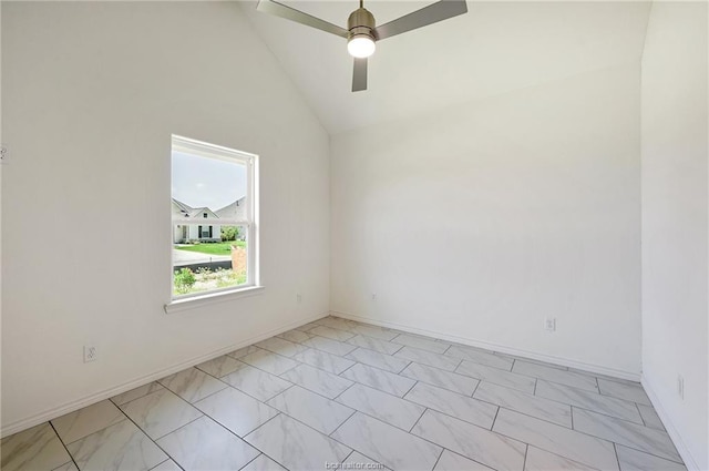 spare room featuring ceiling fan and lofted ceiling