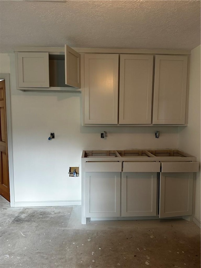 kitchen featuring a textured ceiling