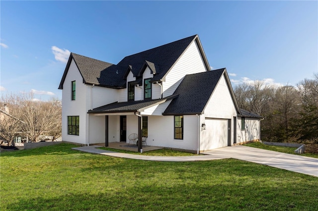 3223 Tamy Ln, Brenham, TX 77833 - view of home's exterior with concrete driveway, an attached garage, a lawn, covered porch, and roof with shingles
