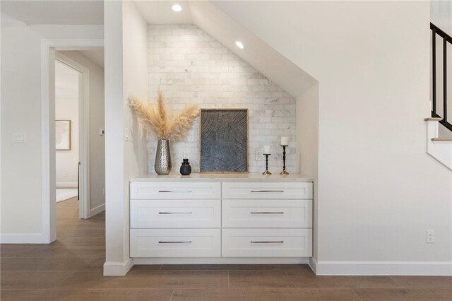 3223 Tamy Ln, Brenham, TX 77833 - detailed view of decorative backsplash, wood finished floors, recessed lighting, and baseboards