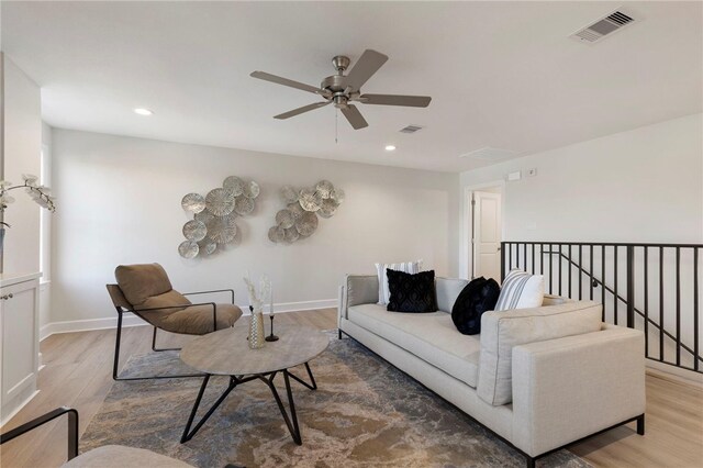 3223 Tamy Ln, Brenham, TX 77833 - living area with a ceiling fan, wood finished floors, recessed lighting, and baseboards