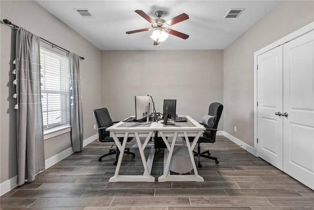 8729 Nathan Dr, Waller, TX 77484 - office area with ceiling fan and dark wood-type flooring