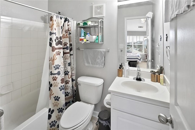 full bathroom featuring vanity, toilet, and shower / bath combo with shower curtain