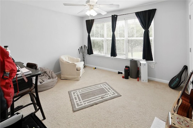 interior space featuring ceiling fan and carpet floors