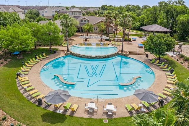 view of swimming pool featuring a gazebo and a patio area