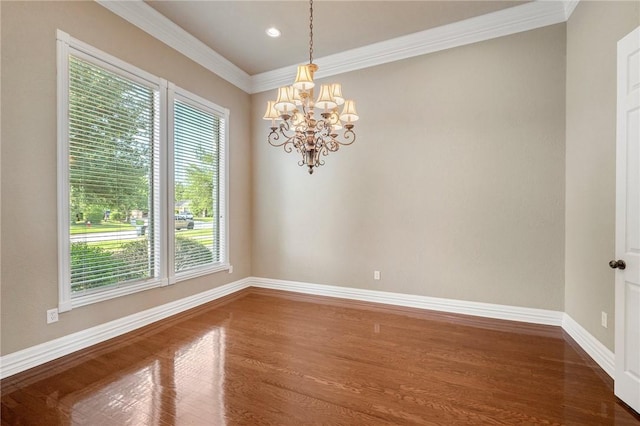 904 Plainfield Ct, College Station, TX 77845 - unfurnished room with wood finished floors, a chandelier, ornamental molding, baseboards, and recessed lighting