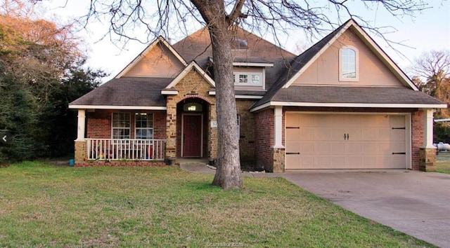 52 Fairway Dr, Normangee, TX 77871 - view of front of home featuring brick siding, a porch, and a front lawn