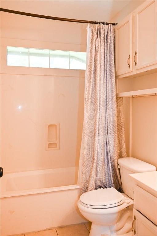 400 Princeton Cir, College Station, TX 77840 - full bathroom with tile patterned flooring, vanity, and shower / bath combination with curtain