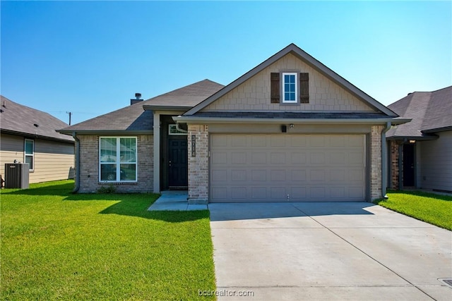 view of front facade with a garage and a front yard