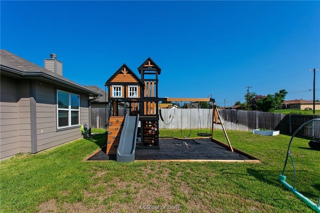 view of play area featuring a lawn