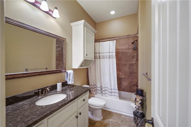 full bathroom with vanity, toilet, and shower / bath combo with shower curtain