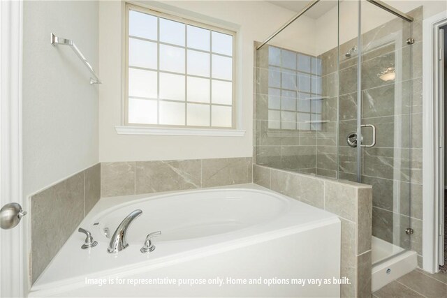 5638 Hayduke Ln, Bryan, TX 77845 - full bath with a shower stall and a garden tub