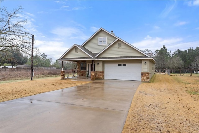 craftsman house featuring a garage and a porch